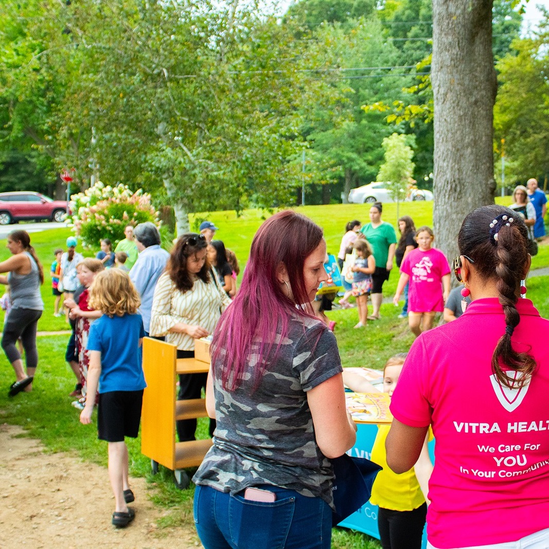 Crowd around Vitra Health Ice cream truck 