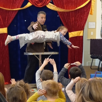 Magic Fred Show - child floating in air