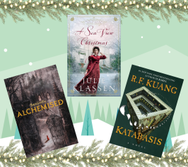 Three book covers are displayed against a winter-themed backdrop with pine branches and lights. The center book, "A Sea View Christmas," depicts a woman in a red dress in a snowy scene. To the left is "Alchemised," featuring a dark, mysterious forest and gate. To the right is "Katabasis," showing an architectural structure. The mood is festive and intriguing.