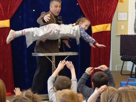 Magic Fred Show - child floating in air