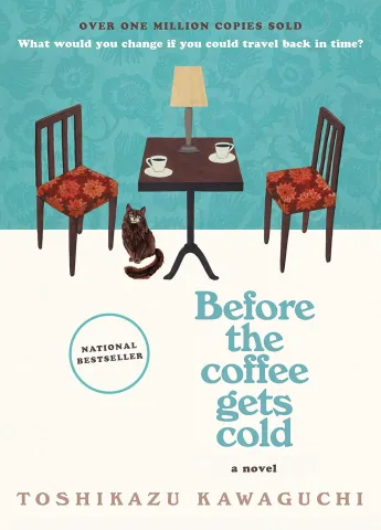 Book cover of "Before the Coffee Gets Cold" by Toshikazu Kawaguchi. Two floral chairs with a table, coffee cups, a lamp, and a cat create a cozy, nostalgic atmosphere.