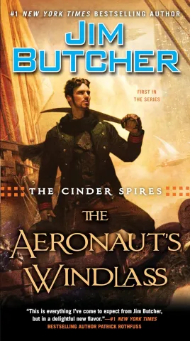 Cover of "The Aeronaut's Windlass" by Jim Butcher features a man standing heroically against a golden sky, with sails and machinery in the background, conveying adventure.