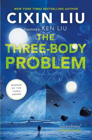 Cover of "The Three-Body Problem" by Cixin Liu, featuring a futuristic scene with a pyramid, planets, and floating rocks. Blue tones suggest a sci-fi atmosphere.