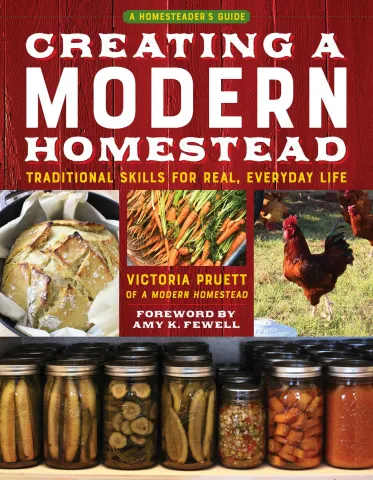 Cover of "Creating a Modern Homestead" features images of fresh bread, carrots, a rooster, and jars of preserved vegetables. Bold, rustic text conveys a practical, traditional feel.