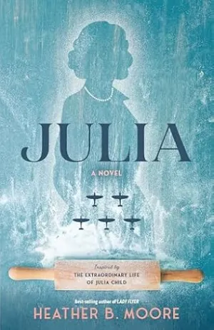 Cover of "Julia: A Novel" by Heather B. Moore features a silhouette of a woman with a whisk. A rolling pin with text appears below, evoking a culinary theme.