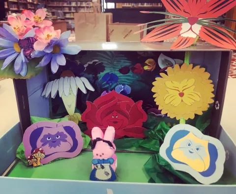 An Alice in Wonderland diorama made using marshmallow peeps.