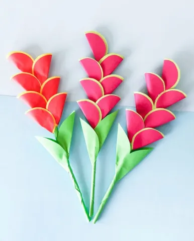 Heliconia flowers made out of colored paper.