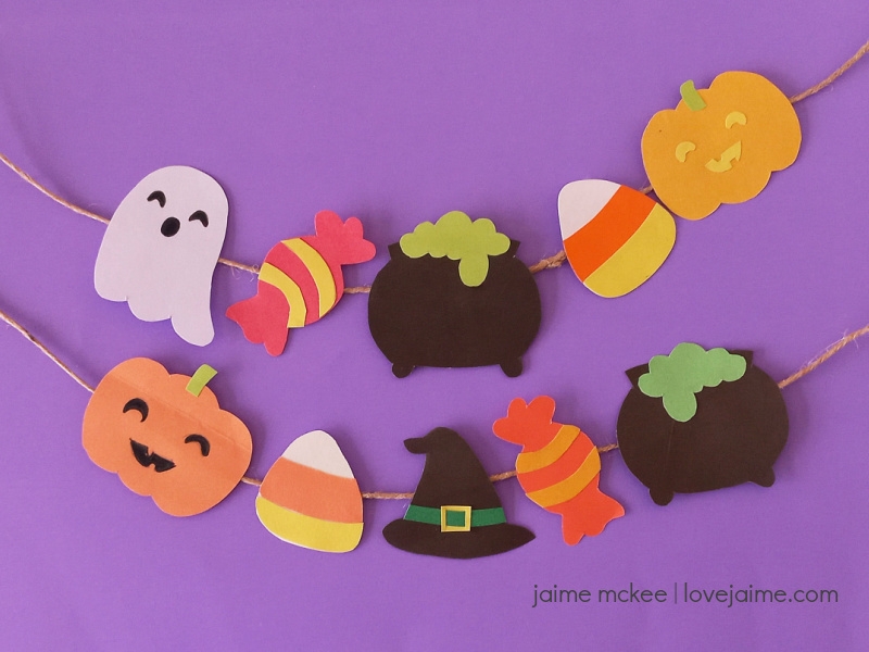 A Halloween-themed DIY garland on a purple background.