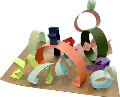 A sculpture made out of colorful strips of paper.